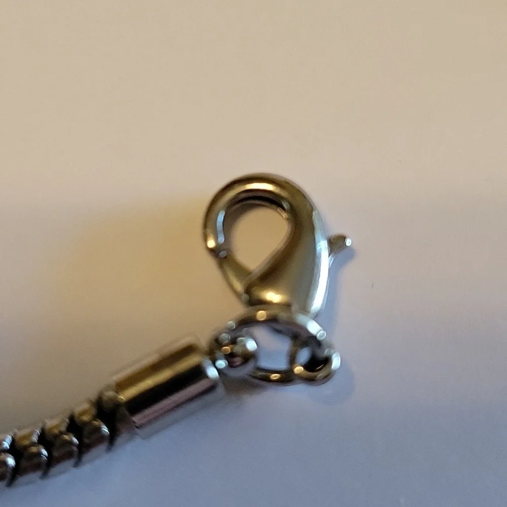 Silver chain with silver, gold, hematite & crystal beads adorn this bracelet - Picture 3 of 6